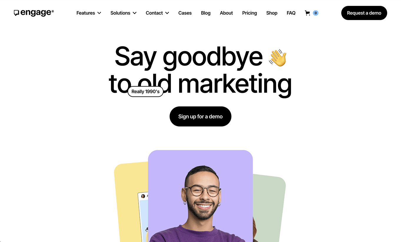Website header with 'Say goodbye to old marketing' text and a smiling man wearing glasses.